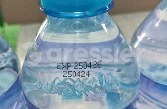 Aplikasi Mesin Coding untuk Botol Plastik PET