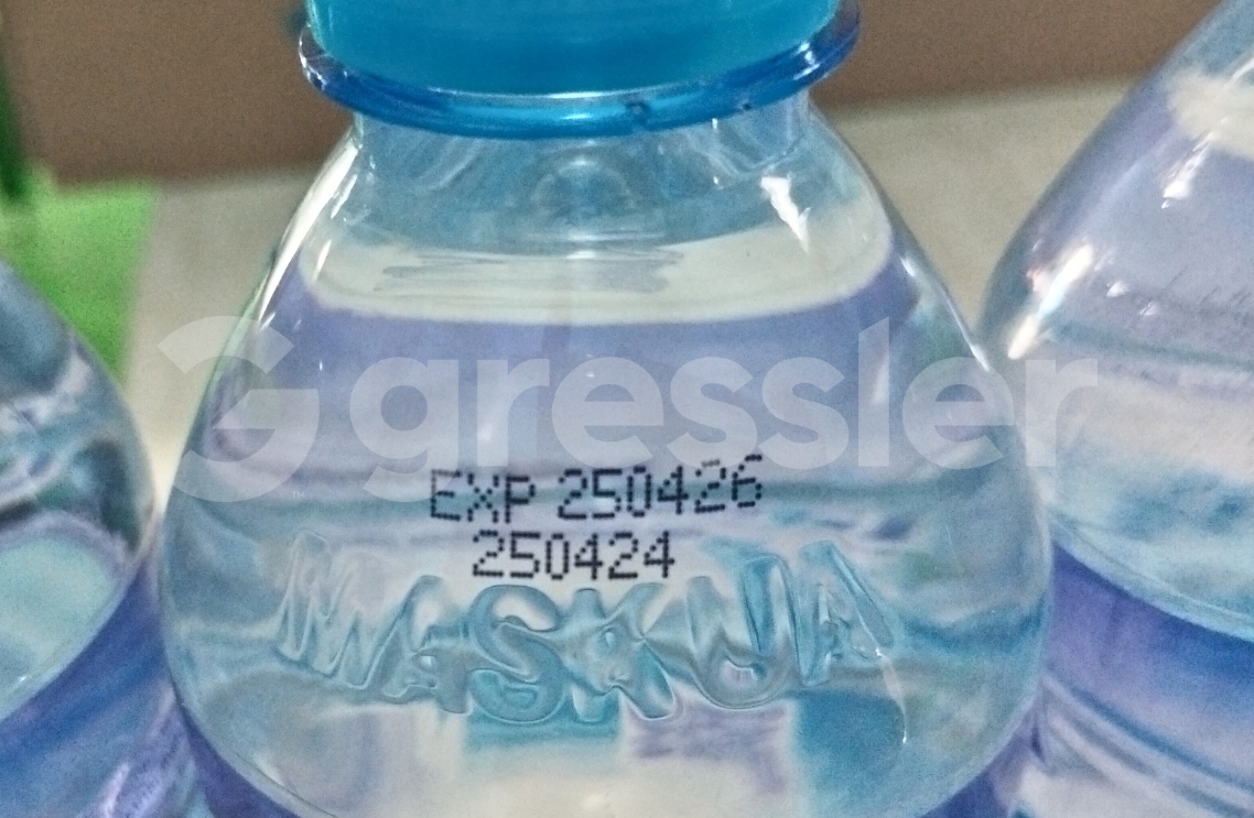 Aplikasi Mesin Coding untuk Botol Plastik PET