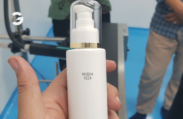 aplikasi mesin coding untuk cetak di botol kemasan kosmetik tube cij